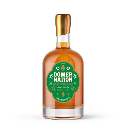 Bottle of Domer Nation whiskey with a gold cap on a white background